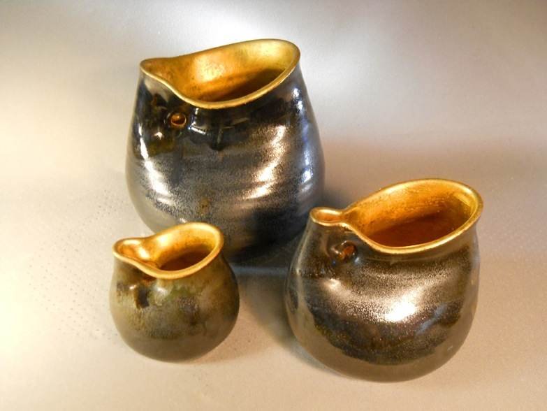 Ceramic prosperity vessels lined with 24K gold leaf